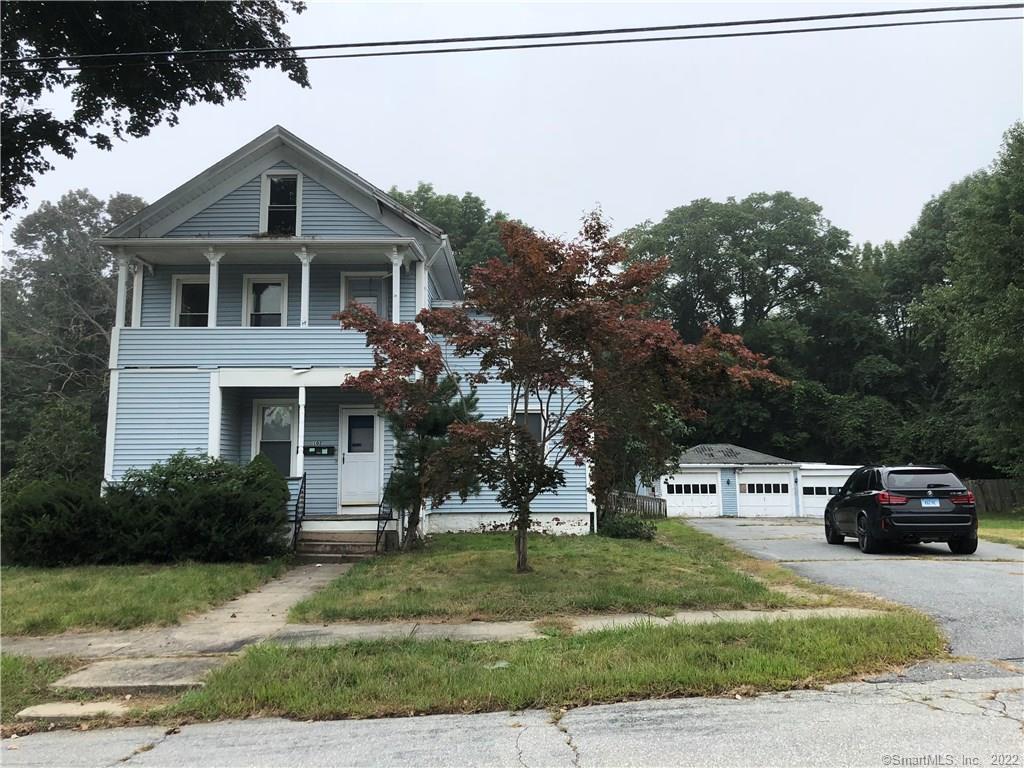 102 Hawkins Street Killingly, CT 06239 - Photo 1 of 1 a front view of a house with a garden