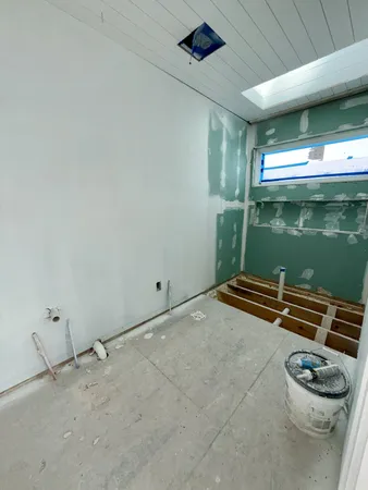 a view of outdoor space with water heater