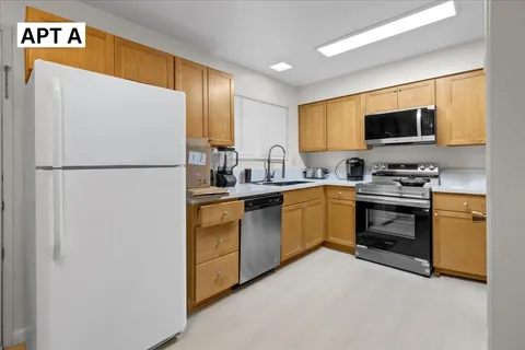 a living room with furniture and window