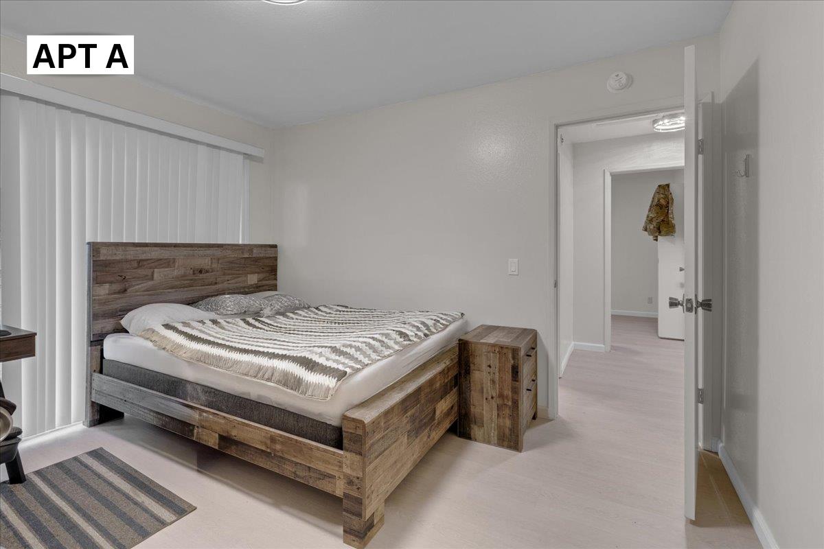 618 Forest Avenue Pacific Grove, CA 93950 - Photo 12 of 78 a bedroom with a bed and a window