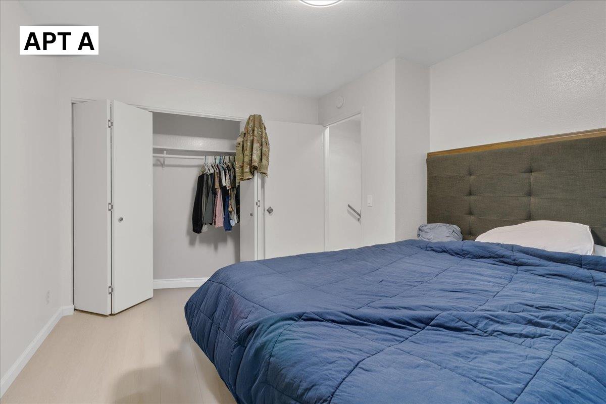 618 Forest Avenue Pacific Grove, CA 93950 - Photo 15 of 78 a bedroom with a bed and a walk in closet