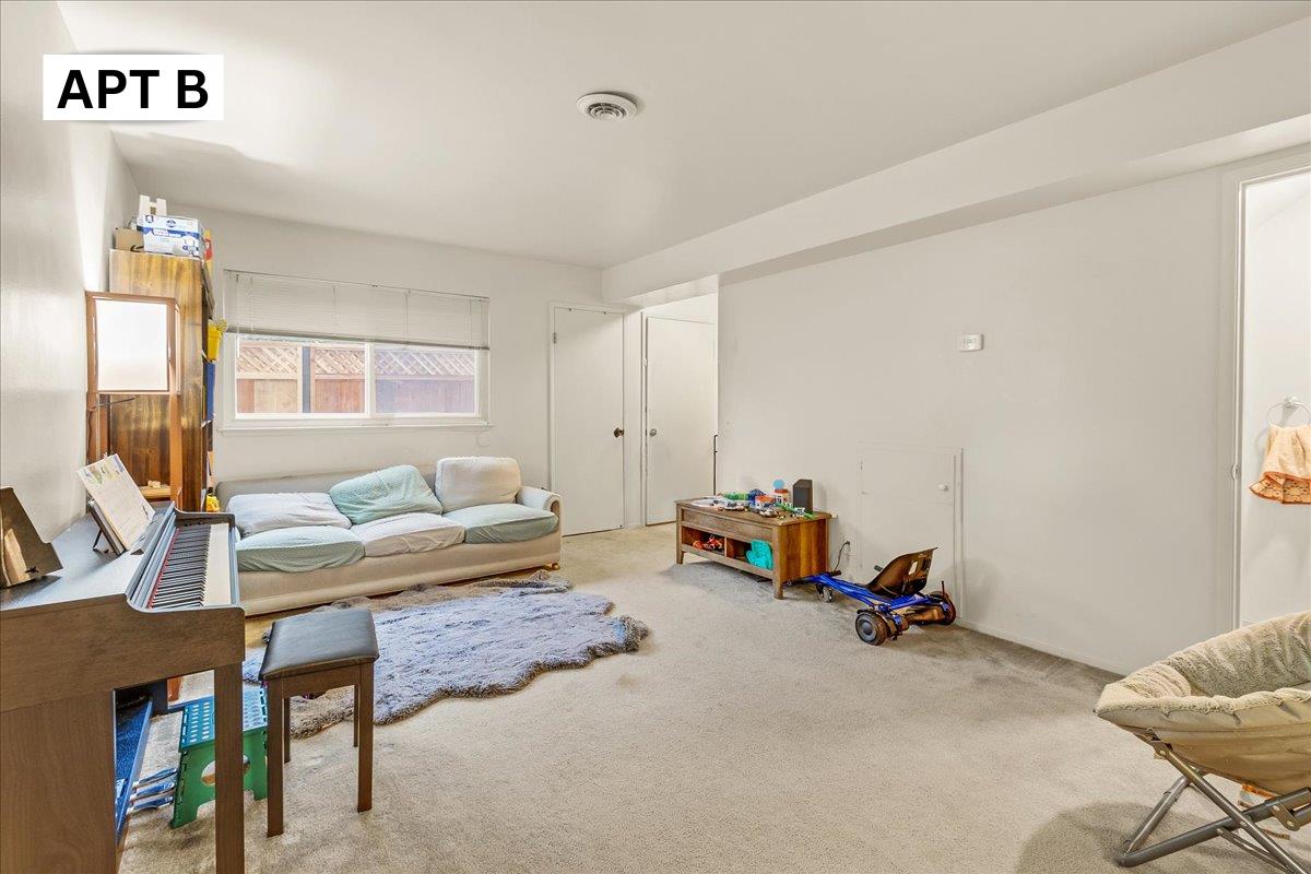 618 Forest Avenue Pacific Grove, CA 93950 - Photo 22 of 78 a living room with furniture and a couch