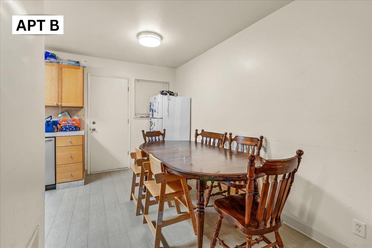 618 Forest Avenue Pacific Grove, CA 93950 - Photo 23 of 78 a view of a dining room with furniture and wooden floor