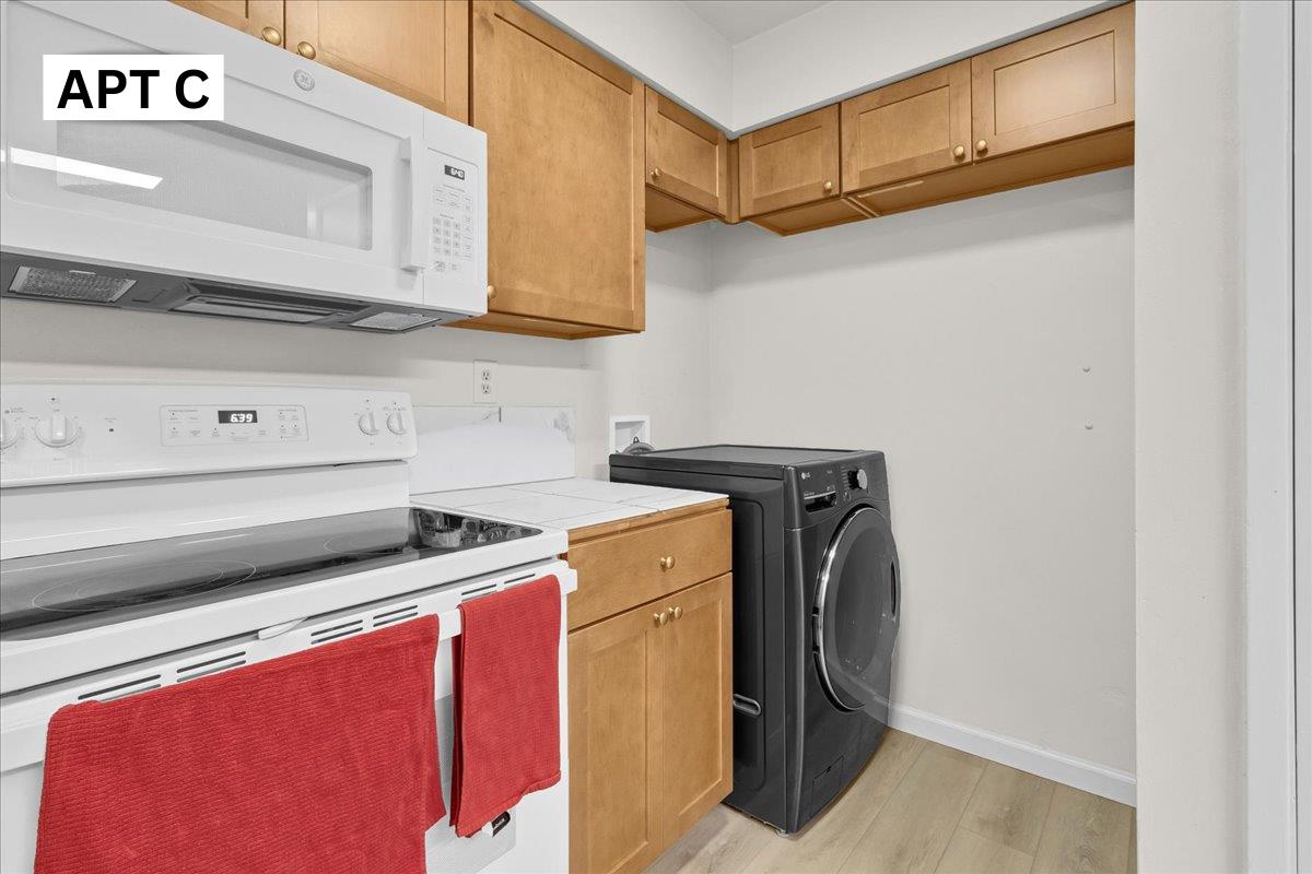 618 Forest Avenue Pacific Grove, CA 93950 - Photo 38 of 78 a utility room with dryer and washer
