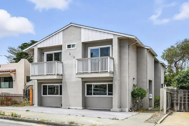 a living room with furniture and window