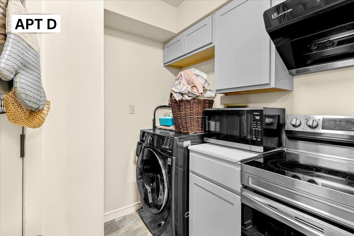 618 Forest Avenue Pacific Grove, CA 93950 - Photo 50 of 78 a kitchen with a stove and a microwave