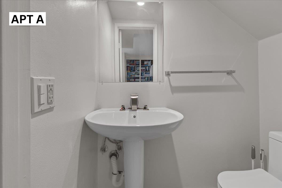 618 Forest Avenue Pacific Grove, CA 93950 - Photo 10 of 78 a bathroom with a sink mirror and toilet