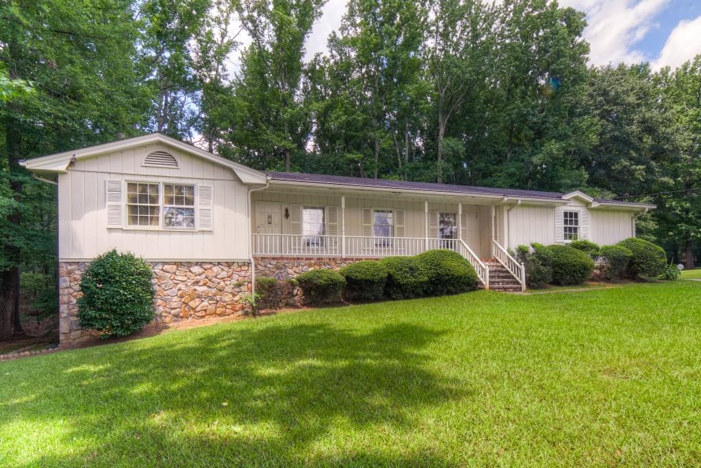 2241 South Deshon Road Lithonia, GA 30058 - Photo 1 of 1 Custom ranch with full, daylight basement on 1/2 acre