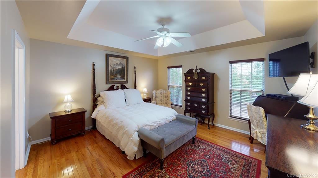 721 Warwick Way Fort Mill, SC 29708 - Photo 14 of 32 a bed room with a bed window and a chair