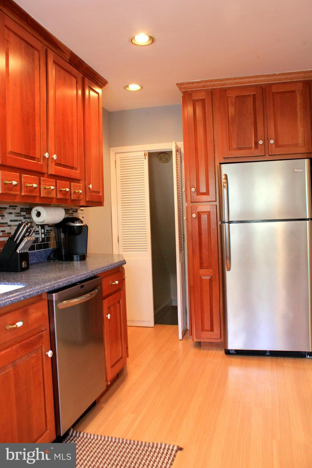 338 Dumbarton Road Baltimore, MD 21212 - Photo 12 of 30 a kitchen with stainless steel appliances a refrigerator and a sink