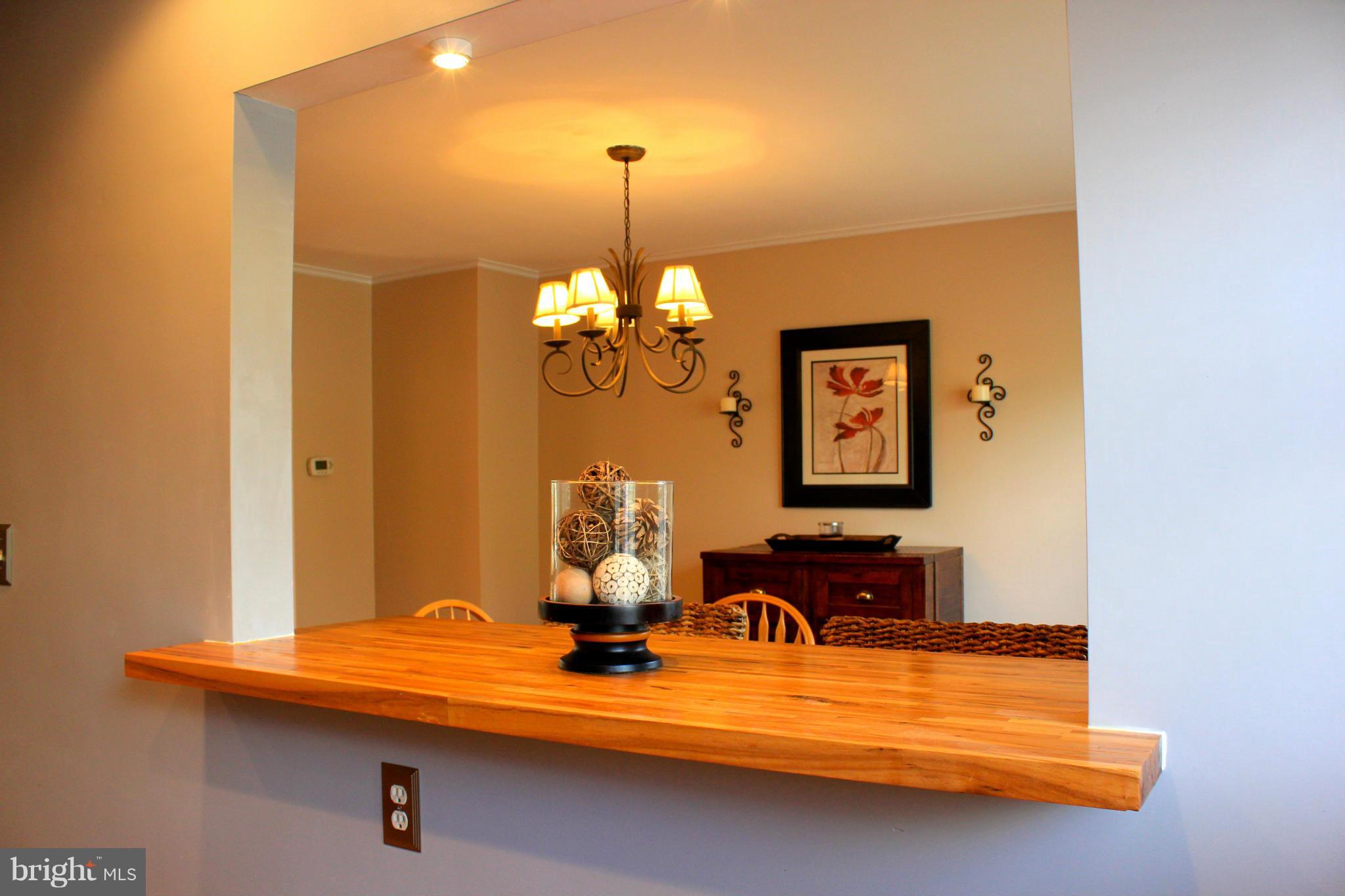 338 Dumbarton Road Baltimore, MD 21212 - Photo 13 of 30 a view of a room with a table and chairs