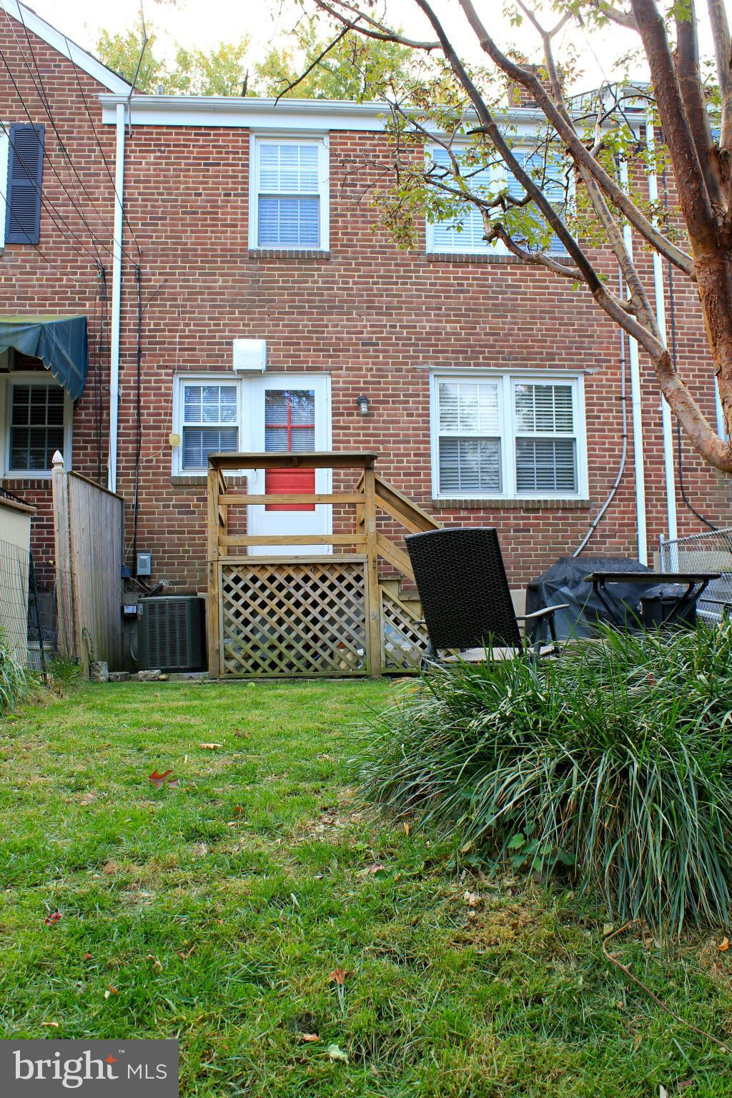 338 Dumbarton Road Baltimore, MD 21212 - Photo 29 of 30 a view of a house with a yard
