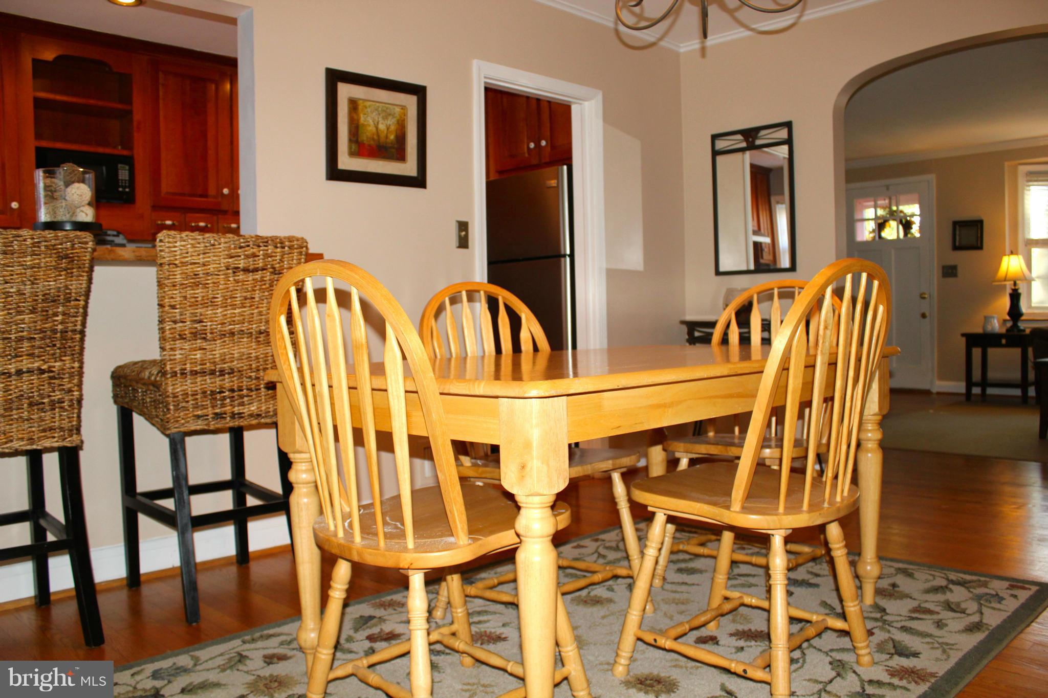 338 Dumbarton Road Baltimore, MD 21212 - Photo 7 of 30 a view of a dining room with furniture and wooden floor
