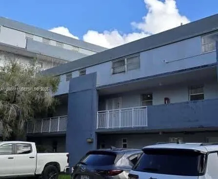 a car parked in front of a building