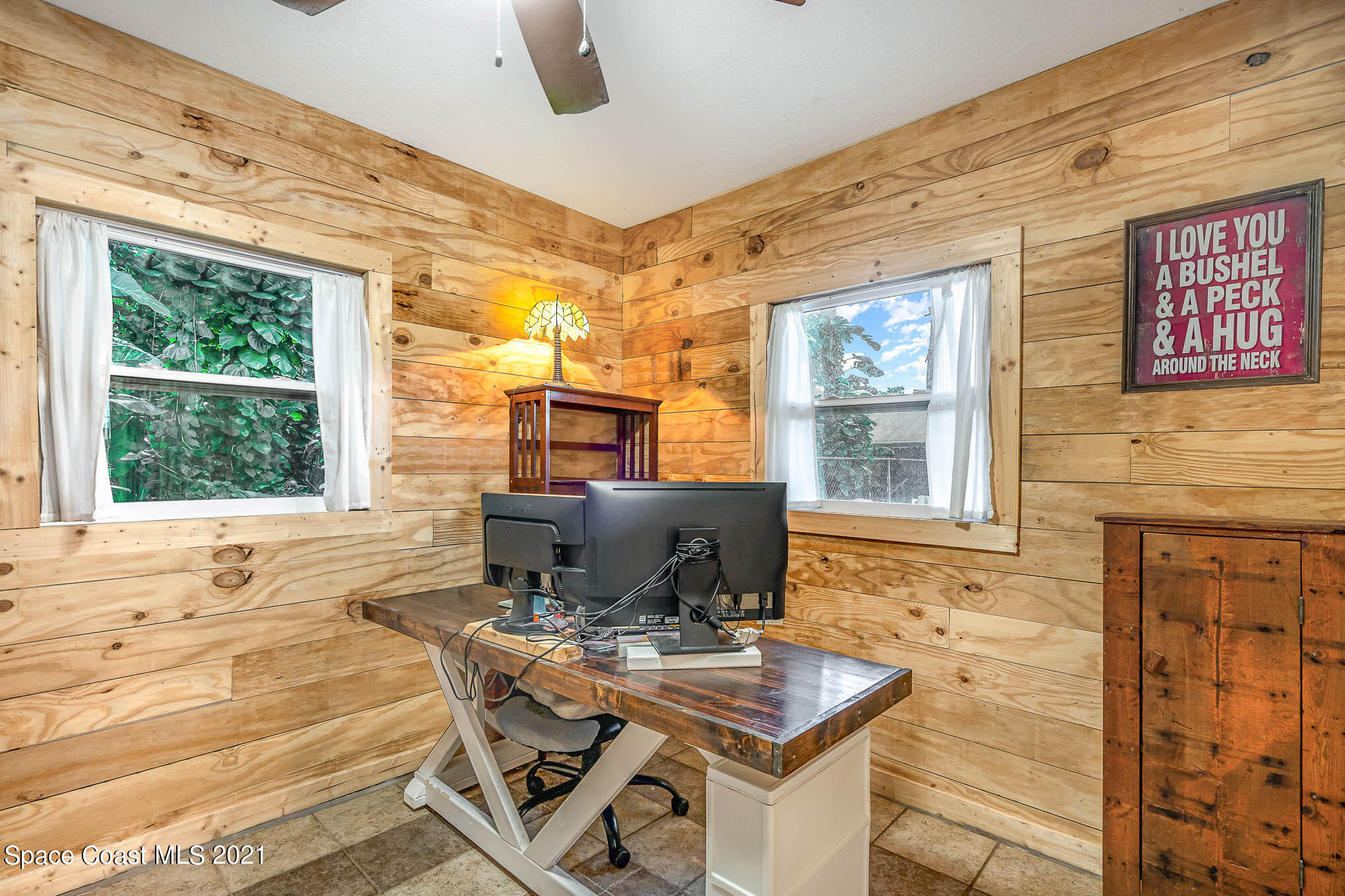 4830 Ancona Road Cocoa, FL 32927 - Photo 22 of 22 a view of a workspace with furniture
