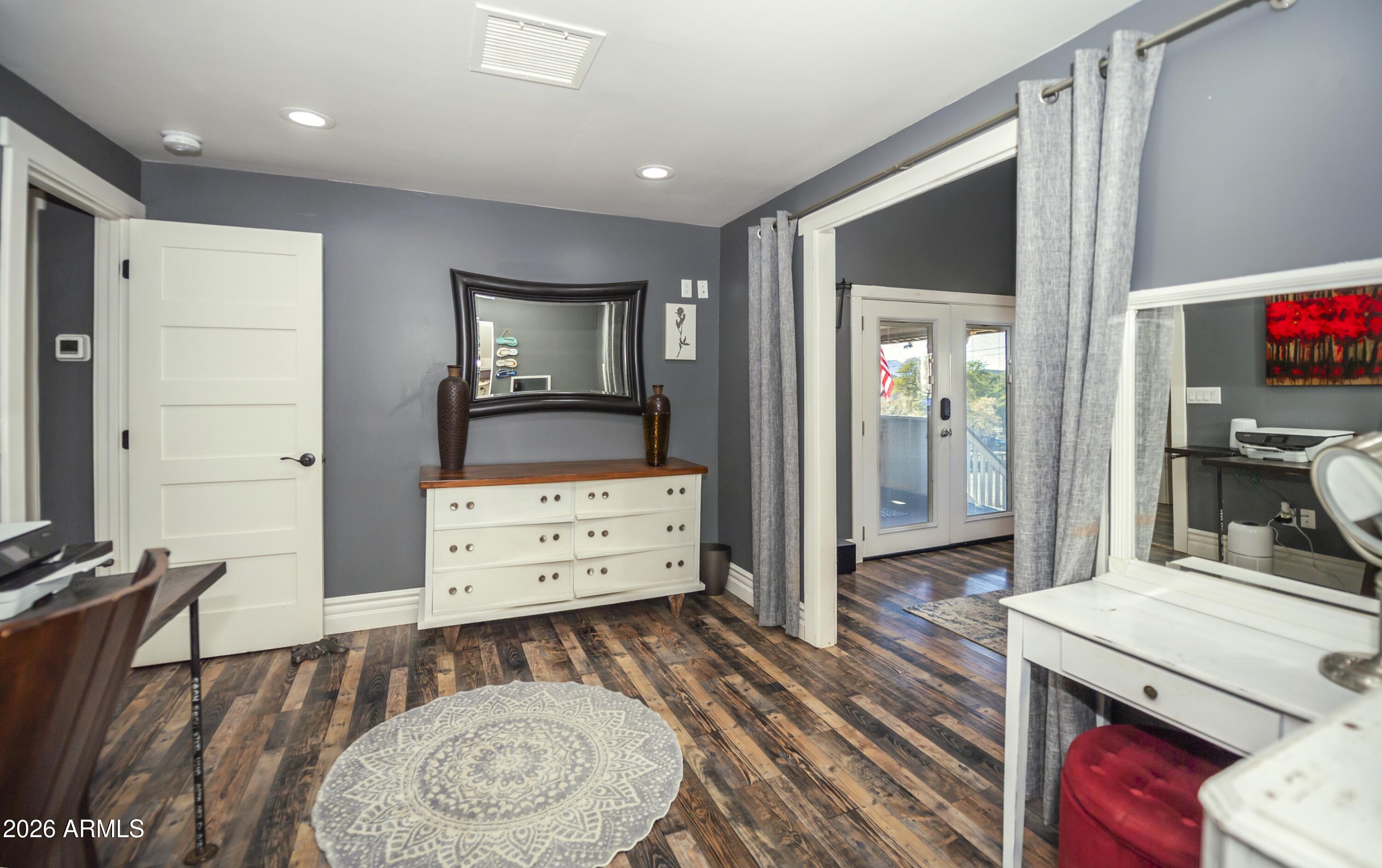 912 West Summit Street Payson, AZ 85541 - Photo 11 of 29 a room with furniture a flat screen tv and a dresser