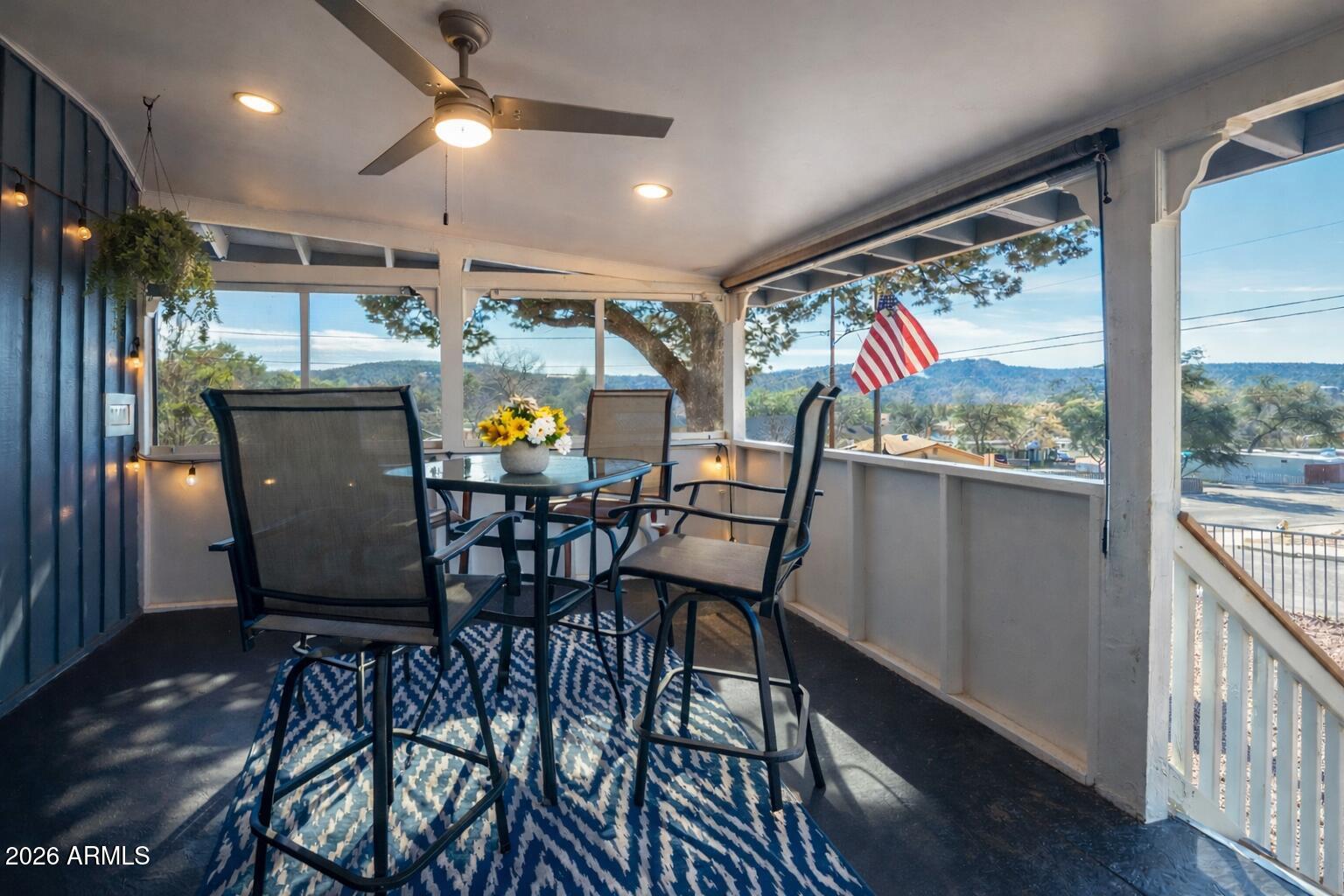 912 West Summit Street Payson, AZ 85541 - Photo 13 of 30 a view of a dining room with furniture one side kitchen view and wooden floor