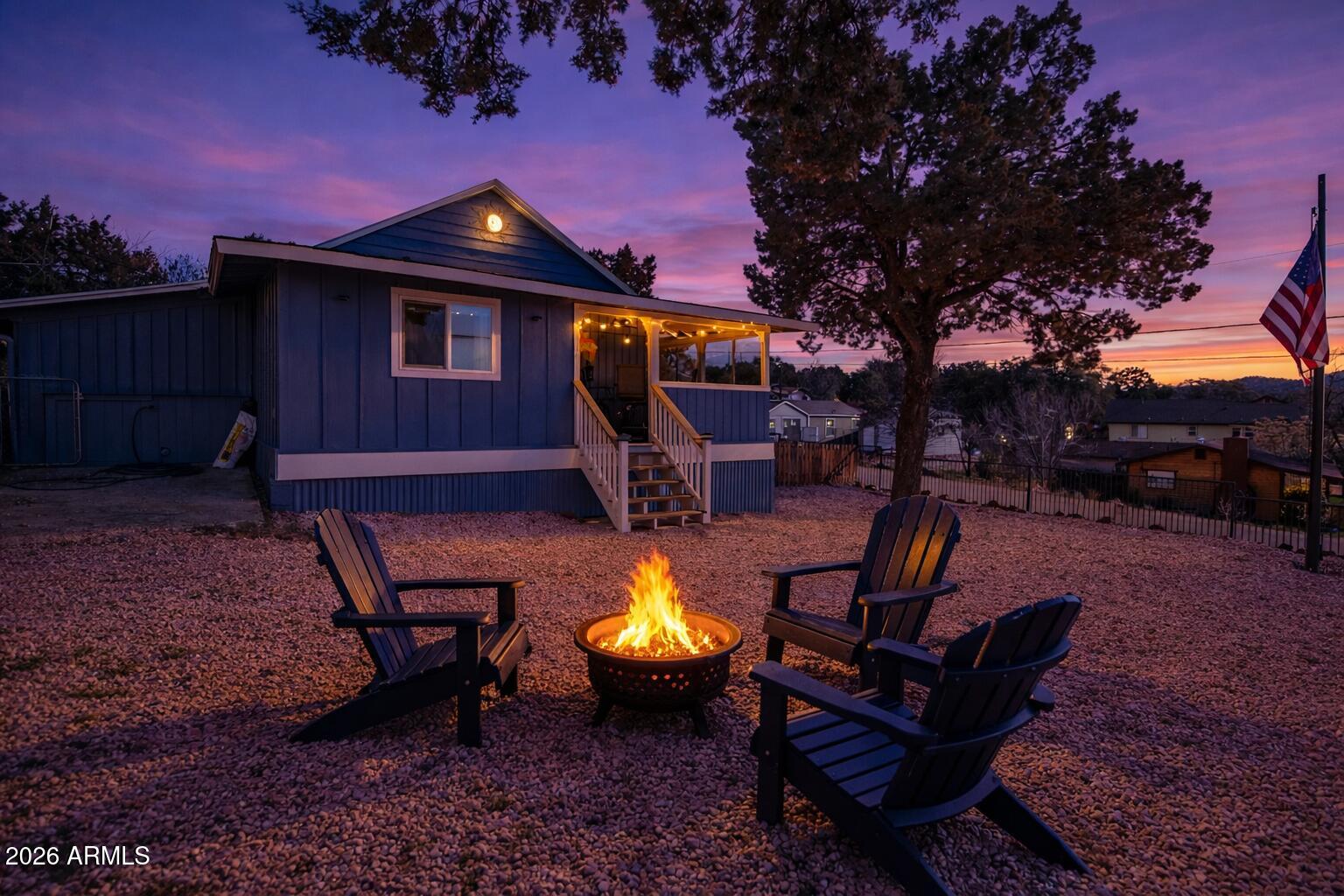 912 West Summit Street Payson, AZ 85541 - Photo 16 of 30 a view of a backyard with sitting area furniture and a fire pit