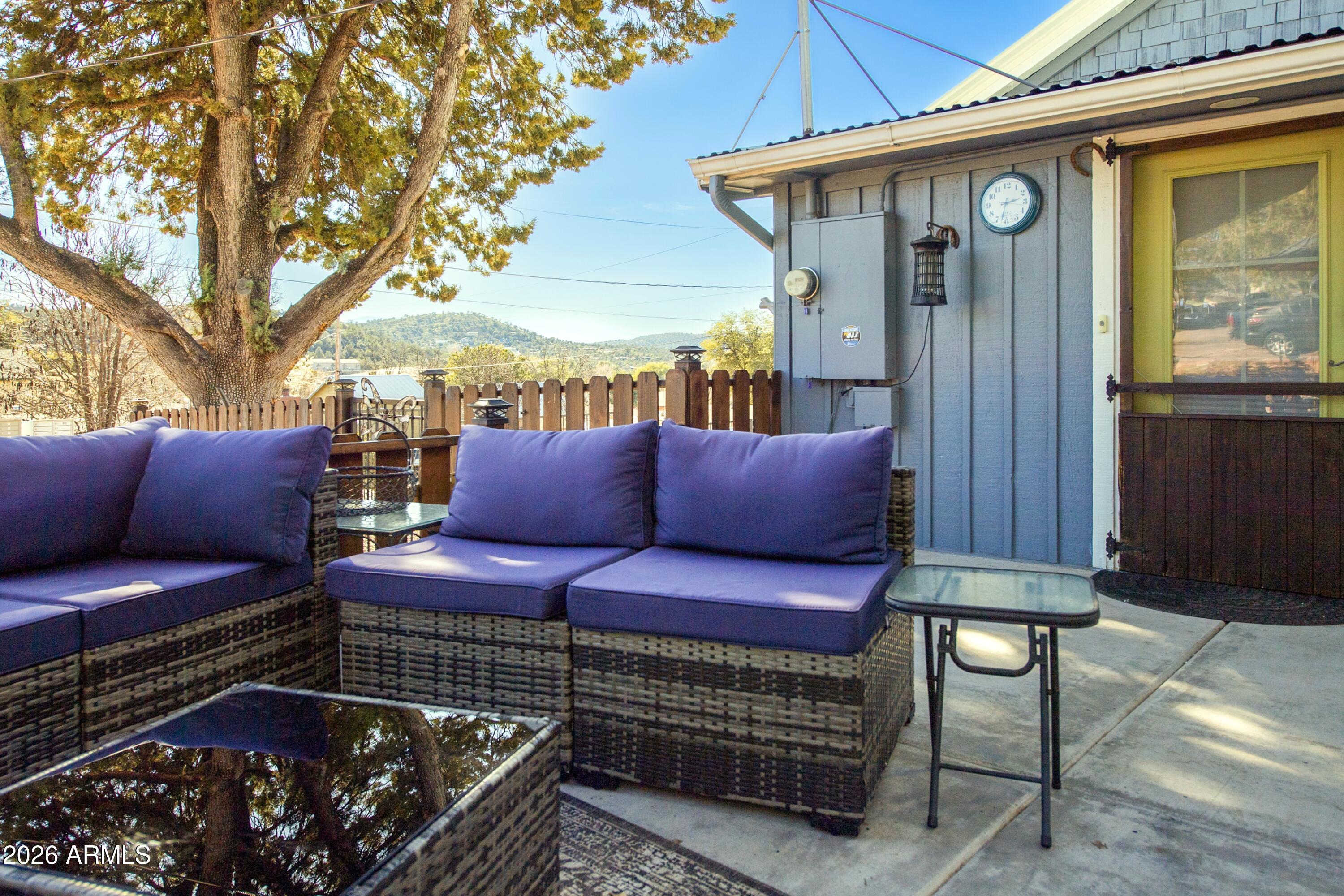 912 West Summit Street Payson, AZ 85541 - Photo 22 of 30 a view of a two chairs in the back yard of the house