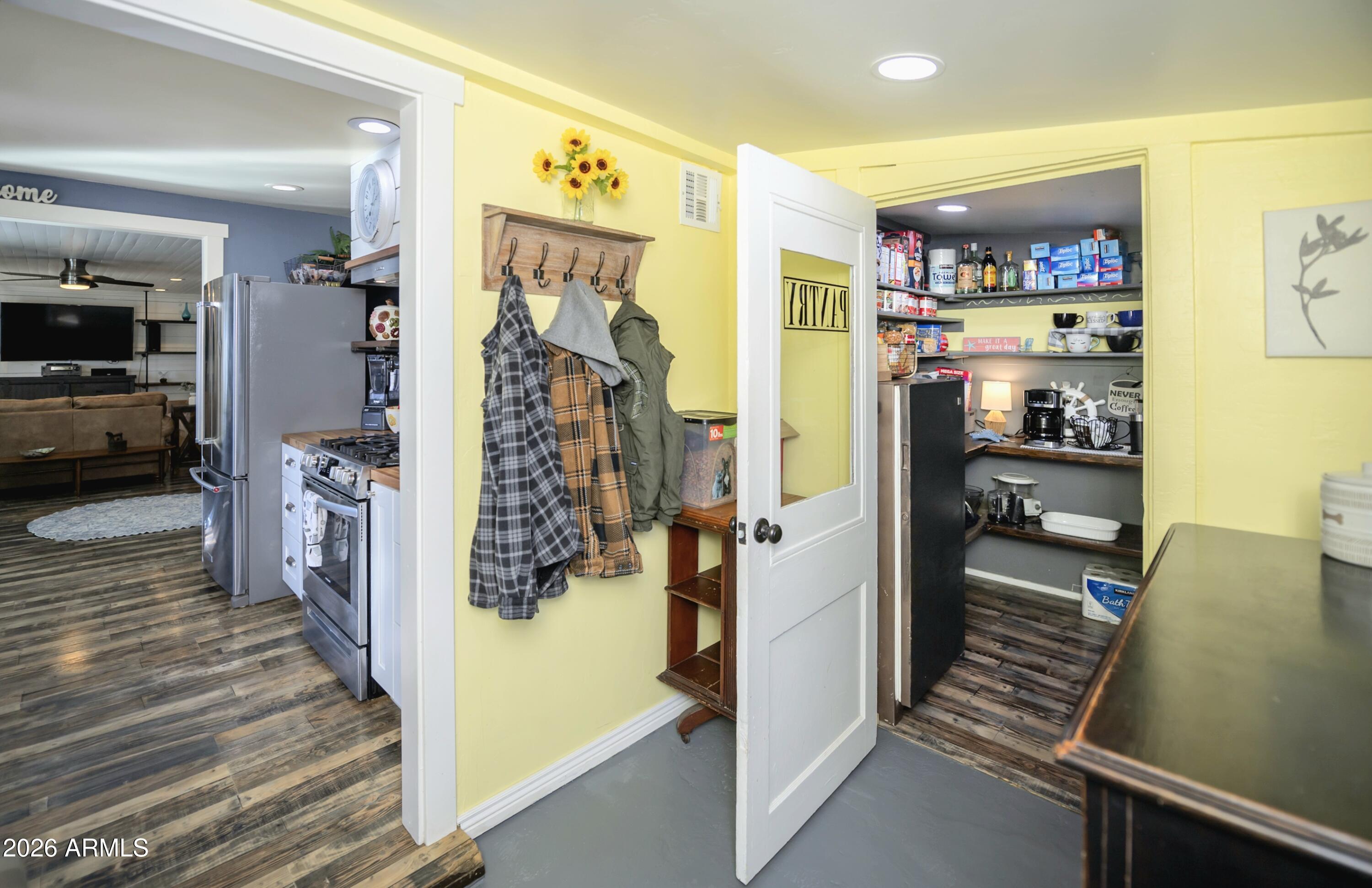 912 West Summit Street Payson, AZ 85541 - Photo 5 of 30 a view of a hallway with wooden shelves