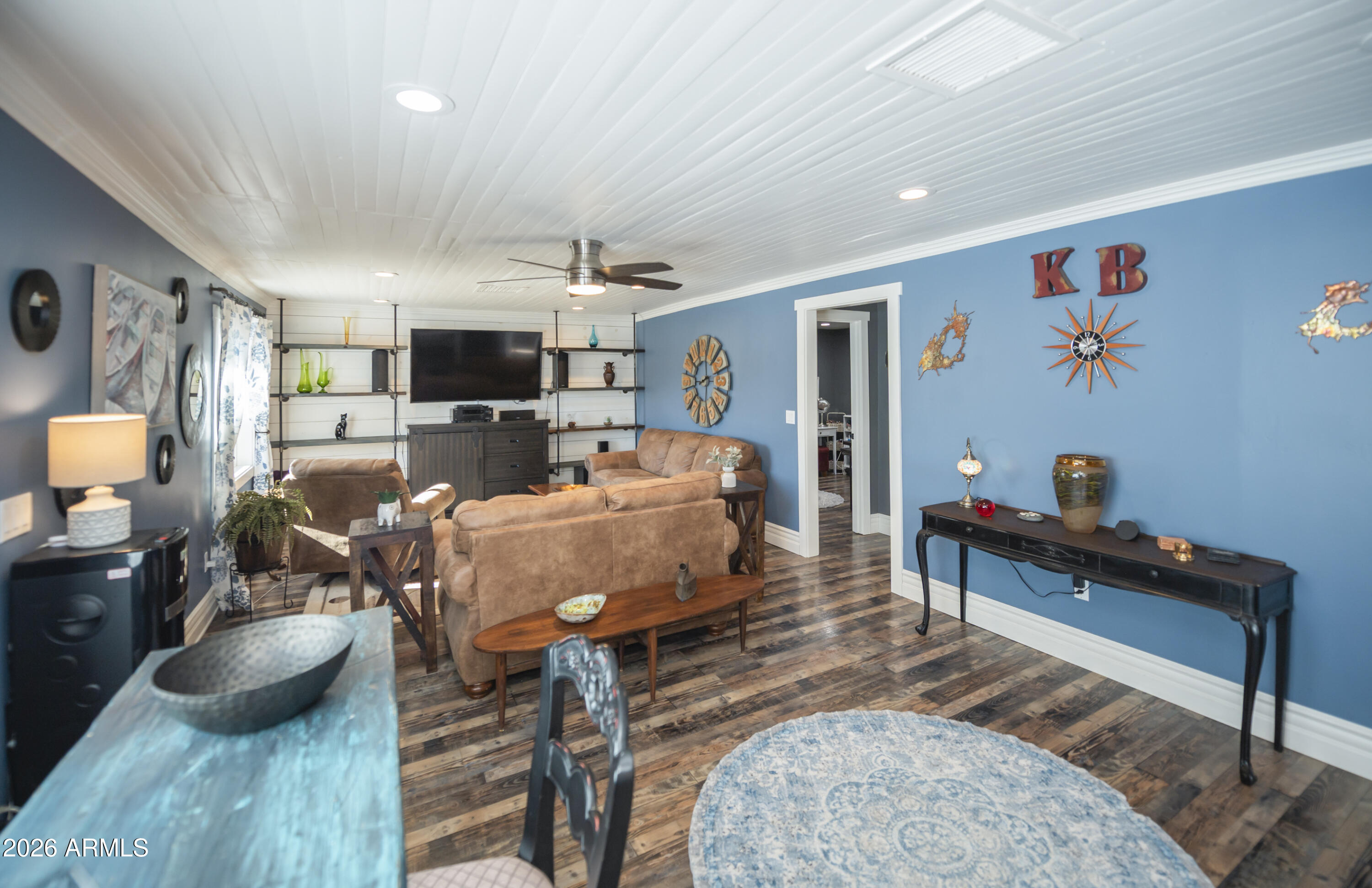 912 West Summit Street Payson, AZ 85541 - Photo 7 of 30 a living room with furniture and a flat screen tv