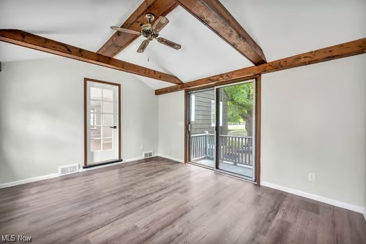 22790 Chardon Road Euclid, OH 44117 - Photo 35 of 35 Spare room featuring ceiling fan, wood-type flooring, and lofted ceiling with beams