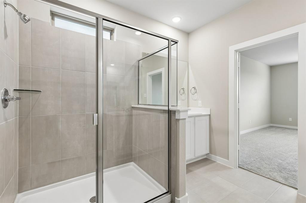 2303 Wind River Road Princeton, TX 75407 - Photo 14 of 32 Primary Bathroom in the Winters home plan by Trophy Signature Homes – REPRESENTATIVE PHOTO