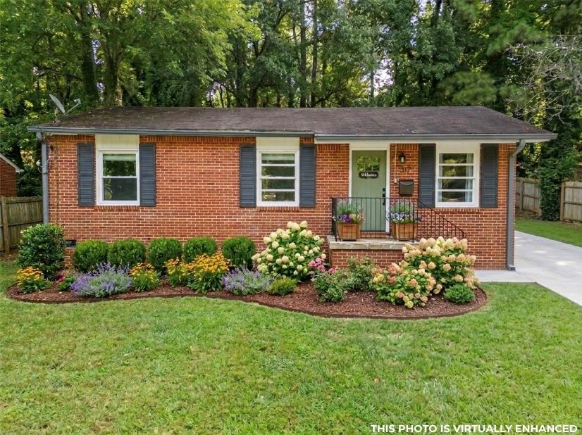 front view of a house with a yard