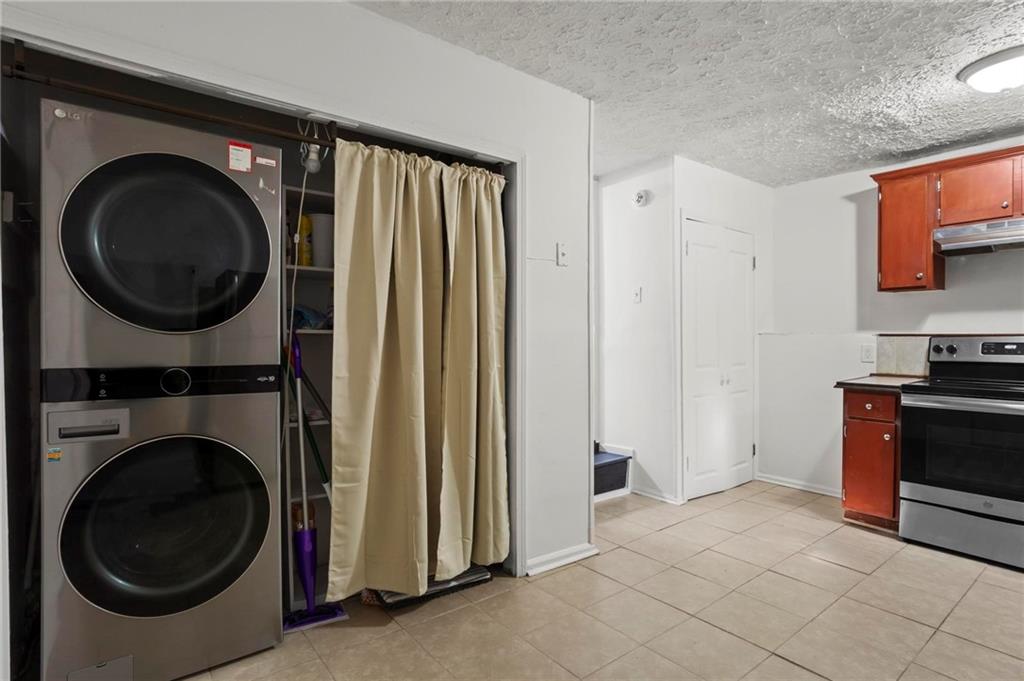 317 Argus Circle Northwest Atlanta, GA 30331 - Photo 13 of 21 a view of a hallway with washer and dryer