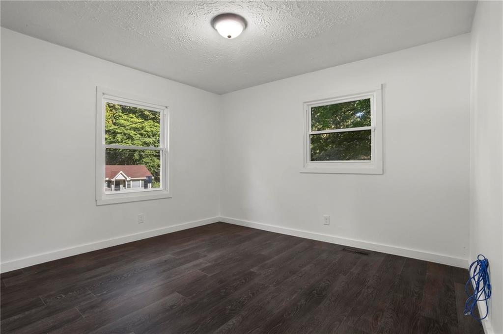 317 Argus Circle Northwest Atlanta, GA 30331 - Photo 18 of 21 an empty room with a window