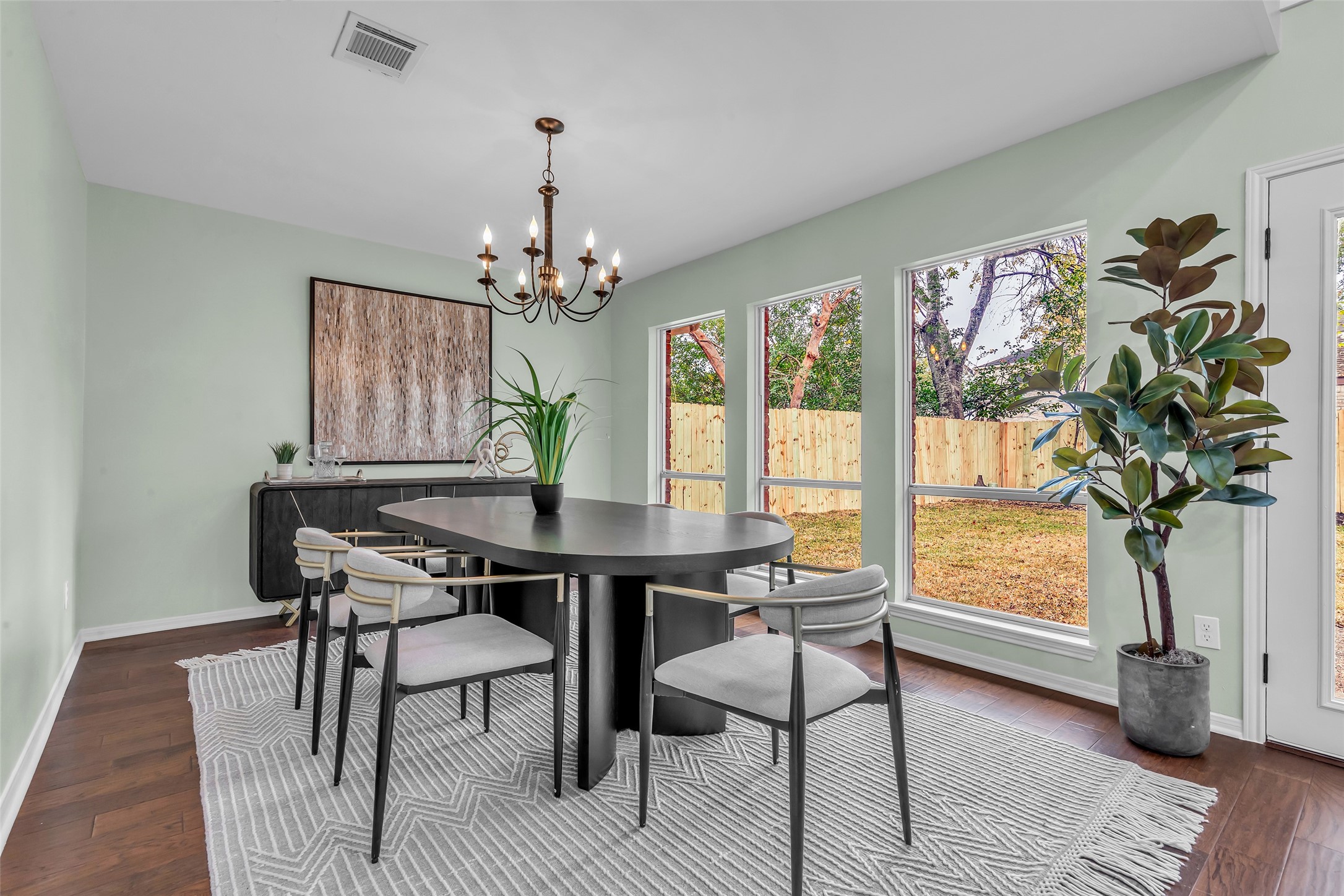 11407 Overbrook Lane Houston, TX 77077 - Photo 8 of 25 Formal dining bathed in natural light overlooking the backyard.