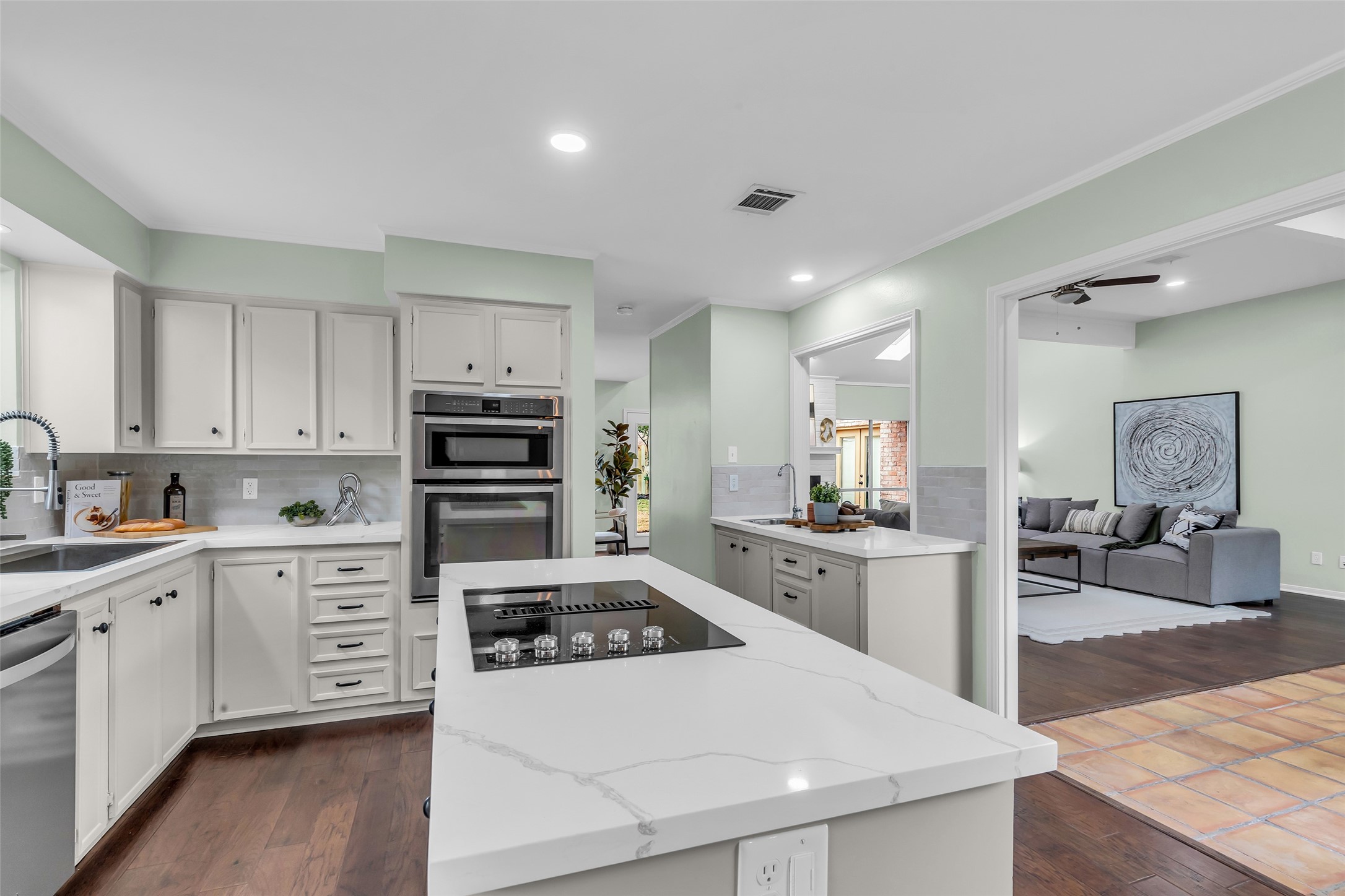 11407 Overbrook Lane Houston, TX 77077 - Photo 9 of 25 Quartz counter tops and new tile backsplash.