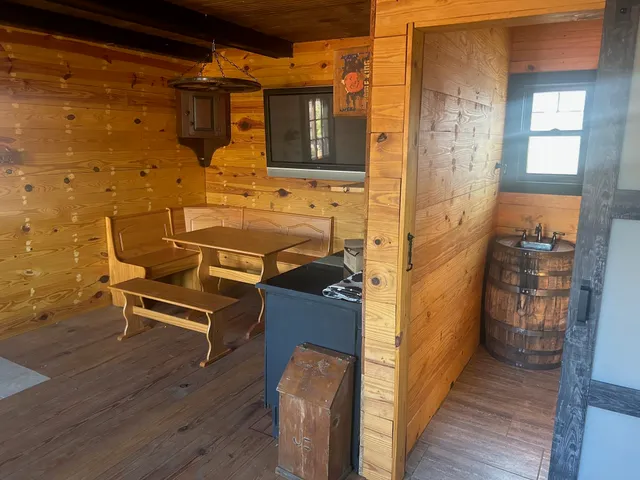 a table and chairs in front of door