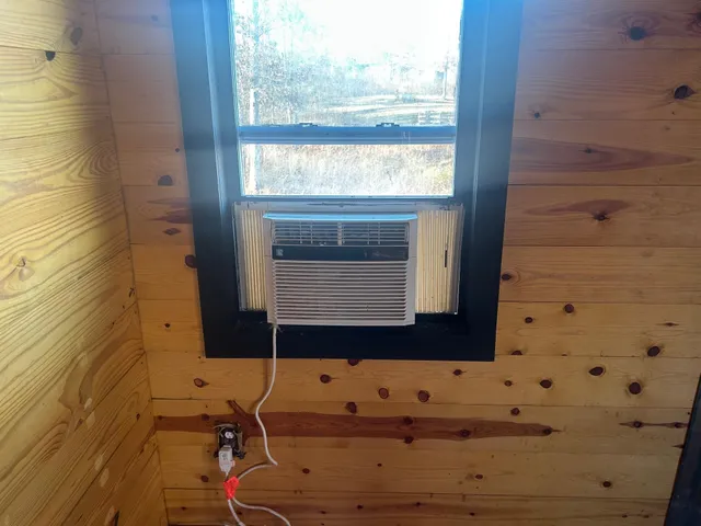 a view of a backyard with water fountain