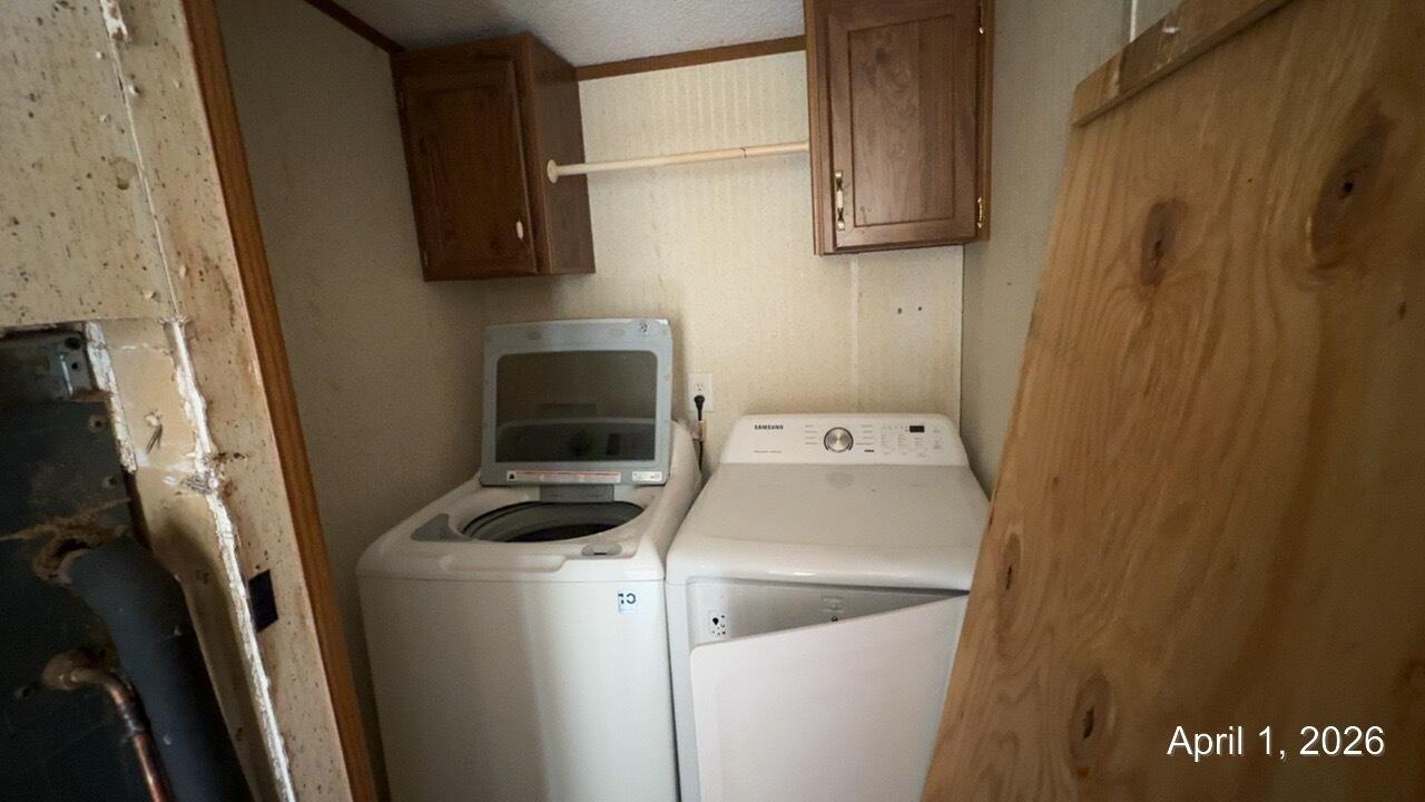 108 Cherokee Lane Thaxton, VA 24174 - Photo 11 of 15 a utility room with dryer and washer
