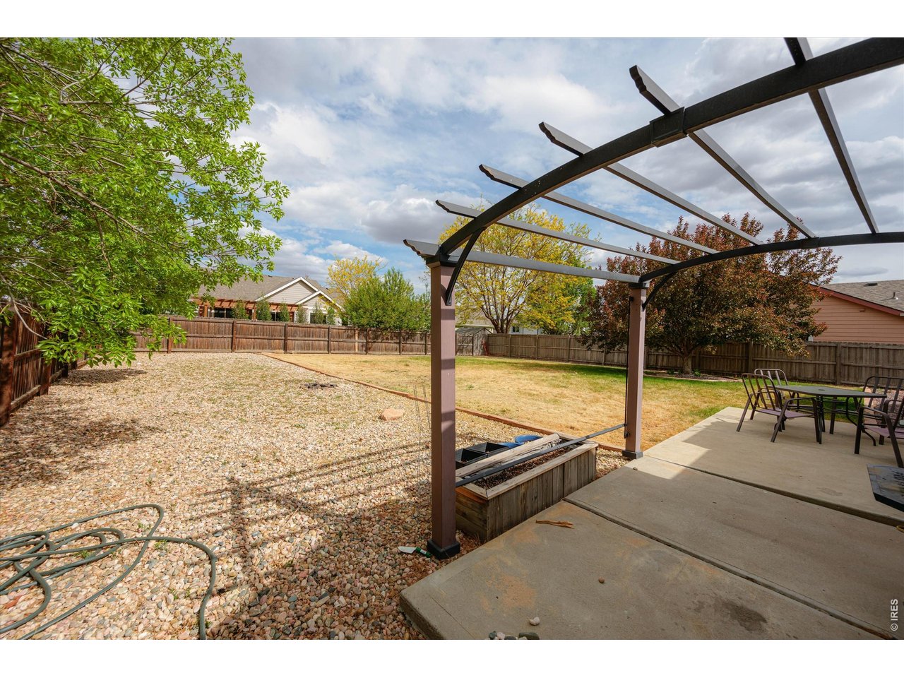 84 Pike Lane Severance, CO 80550 - Photo 11 of 34 a view of a swimming pool with a yard