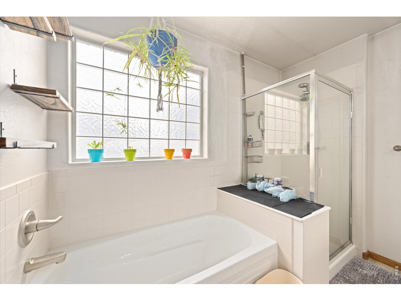 84 Pike Lane Severance, CO 80550 - Photo 26 of 34 a white bath tub sitting next to a window