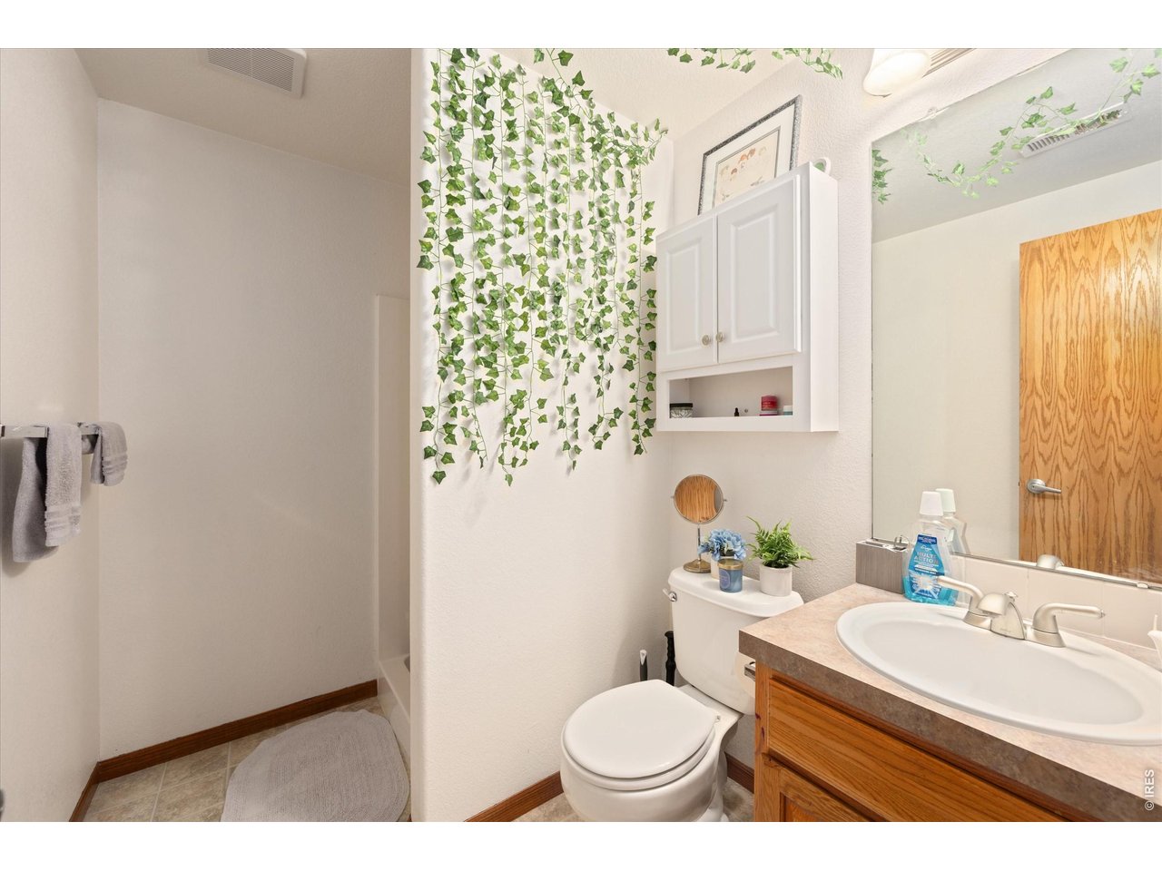 84 Pike Lane Severance, CO 80550 - Photo 30 of 34 a bathroom with a sink toilet and shower