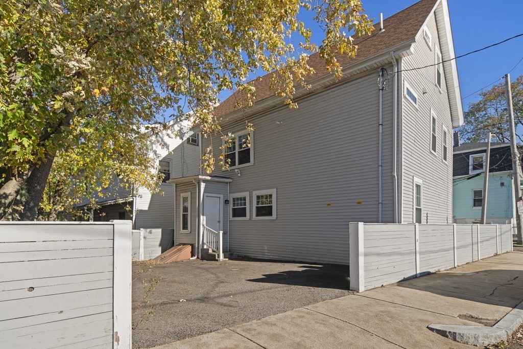 47 Notre Dame Street, Unit 1 Boston, MA 02119 - Photo 11 of 11 a backyard of a house