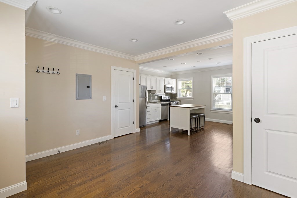 47 Notre Dame Street, Unit 1 Boston, MA 02119 - Photo 4 of 11 a kitchen with a refrigerator and a sink