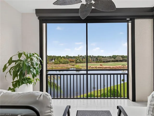 a view of kitchen with furniture and window