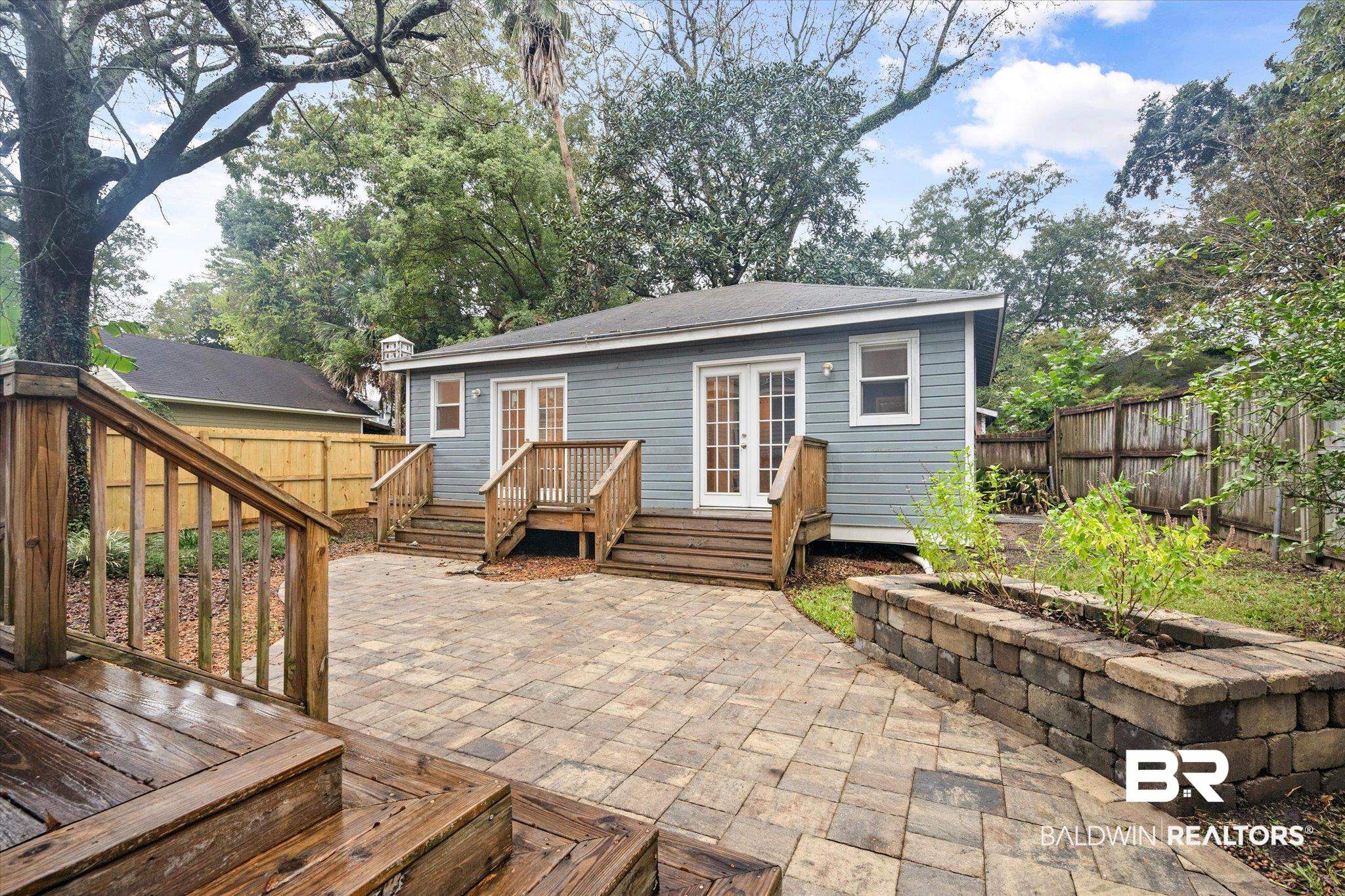14 South Monterey Street Mobile, AL 36604 - Photo 20 of 41 Back of house with a wooden deck, french doors, and a patio area