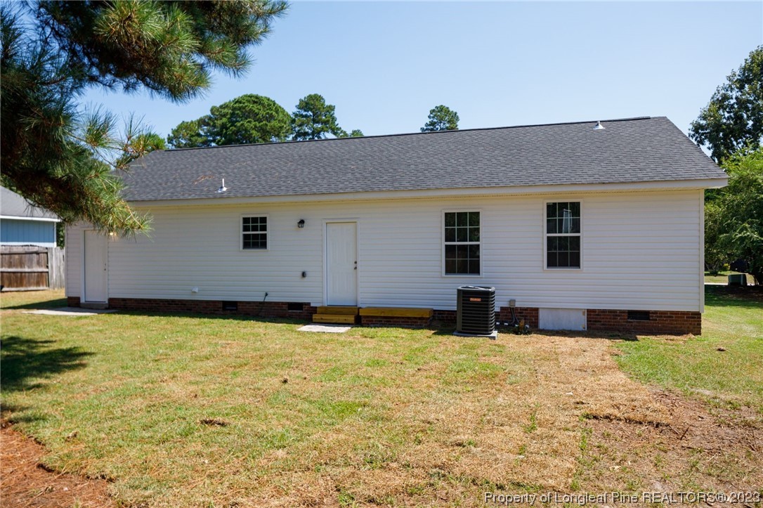 942 Rim Road Fayetteville, NC 28314 - Photo 14 of 14 a backyard of a house