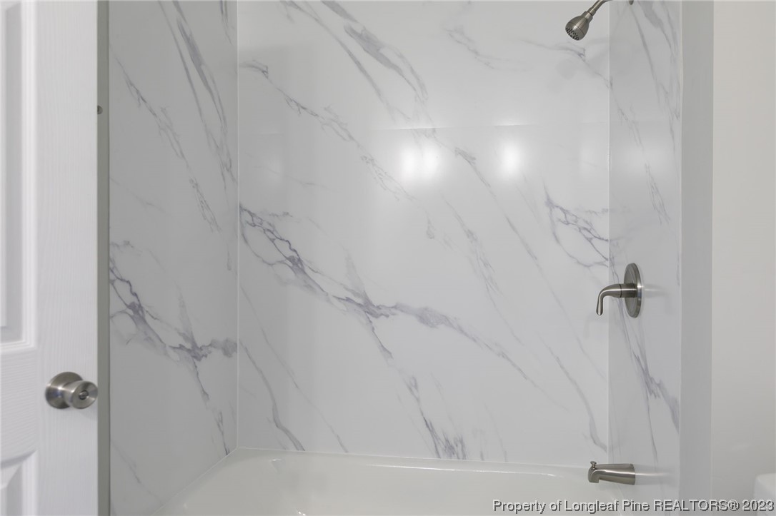 942 Rim Road Fayetteville, NC 28314 - Photo 8 of 14 a bathroom with a shower