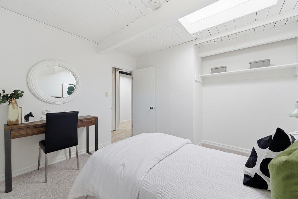 2203 Allegheny Way San Mateo, CA 94402 - Photo 14 of 56 a bedroom with a bed a desk and chair