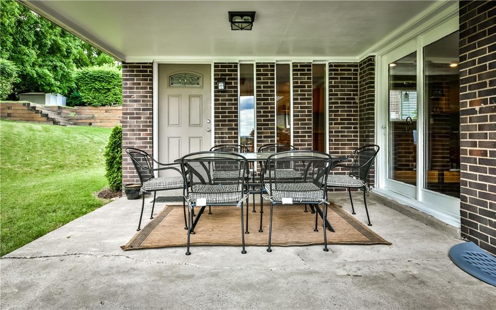 704 Flint Road Allison Park, PA 15101 - Photo 22 of 24 Walk out to the Patio from the Kitchen door or the Dining Room Sliding Glass Doors