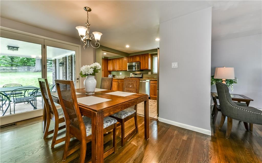 704 Flint Road Allison Park, PA 15101 - Photo 5 of 24 Dining Room with Sliding Glass Door to Covered Patio