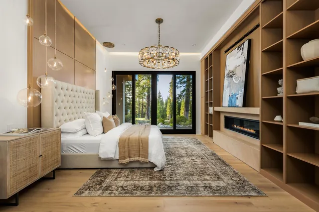 a living room with furniture fireplace and windows