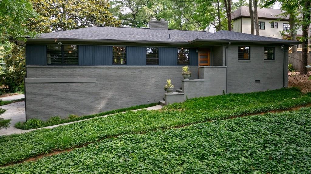 776 Windsor Parkway Sandy Springs, GA 30342 - Photo 1 of 1 a front view of a house with garden