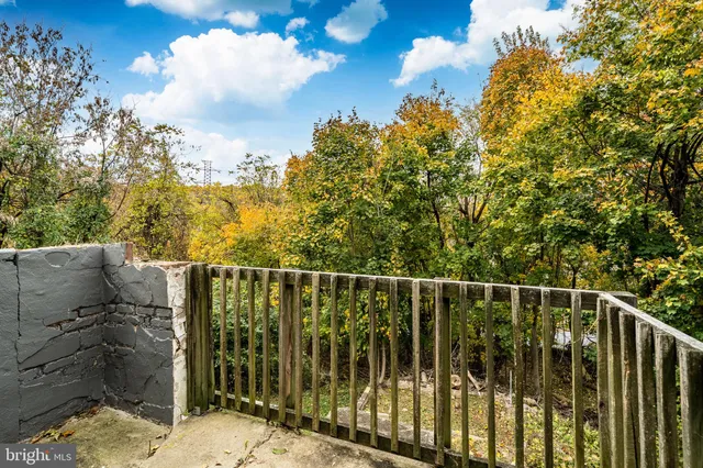 a view of a balcony with an outdoor space